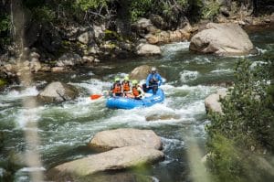 Group rafting with helmets