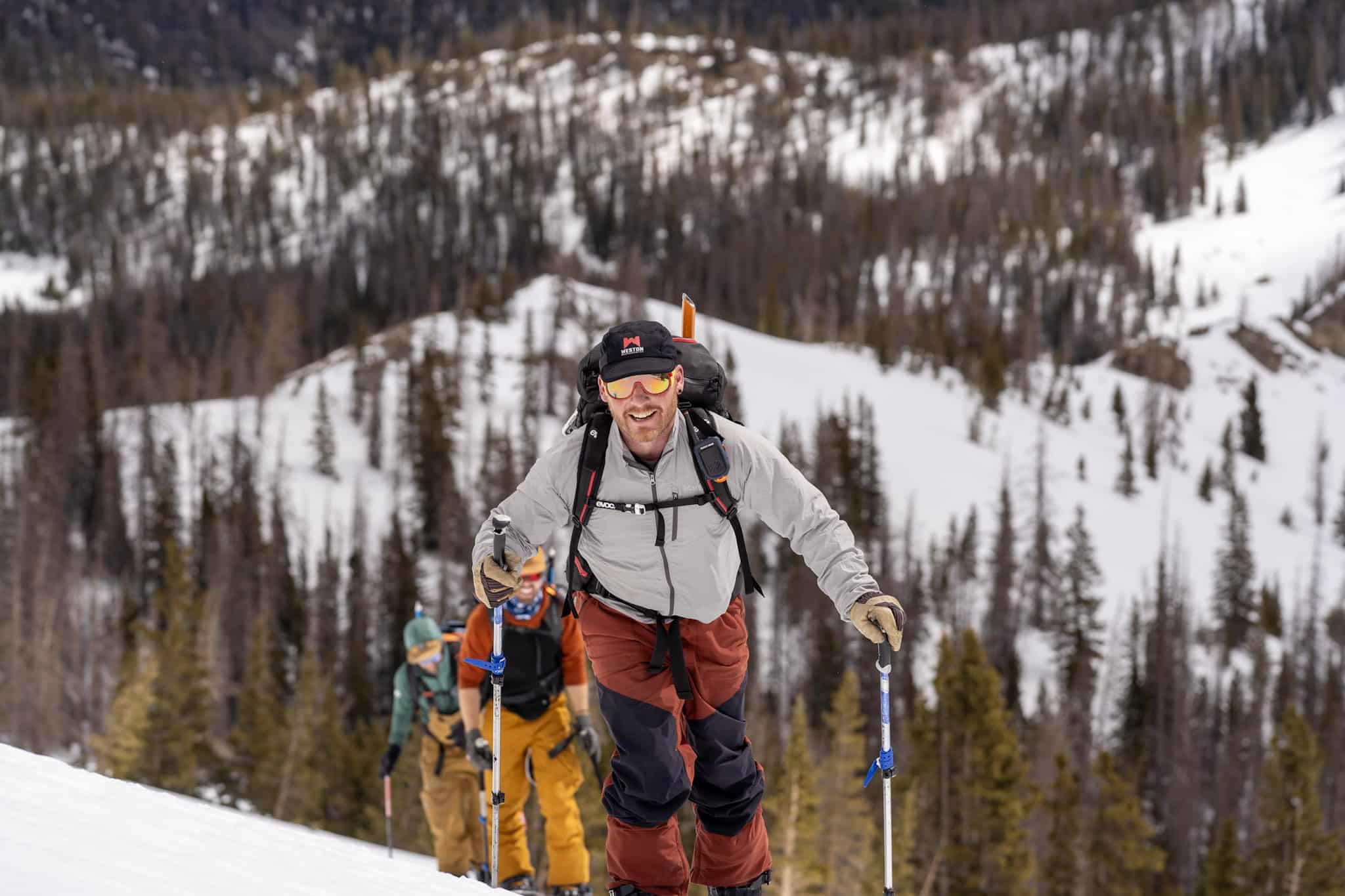 Group on side of mountain with vista view