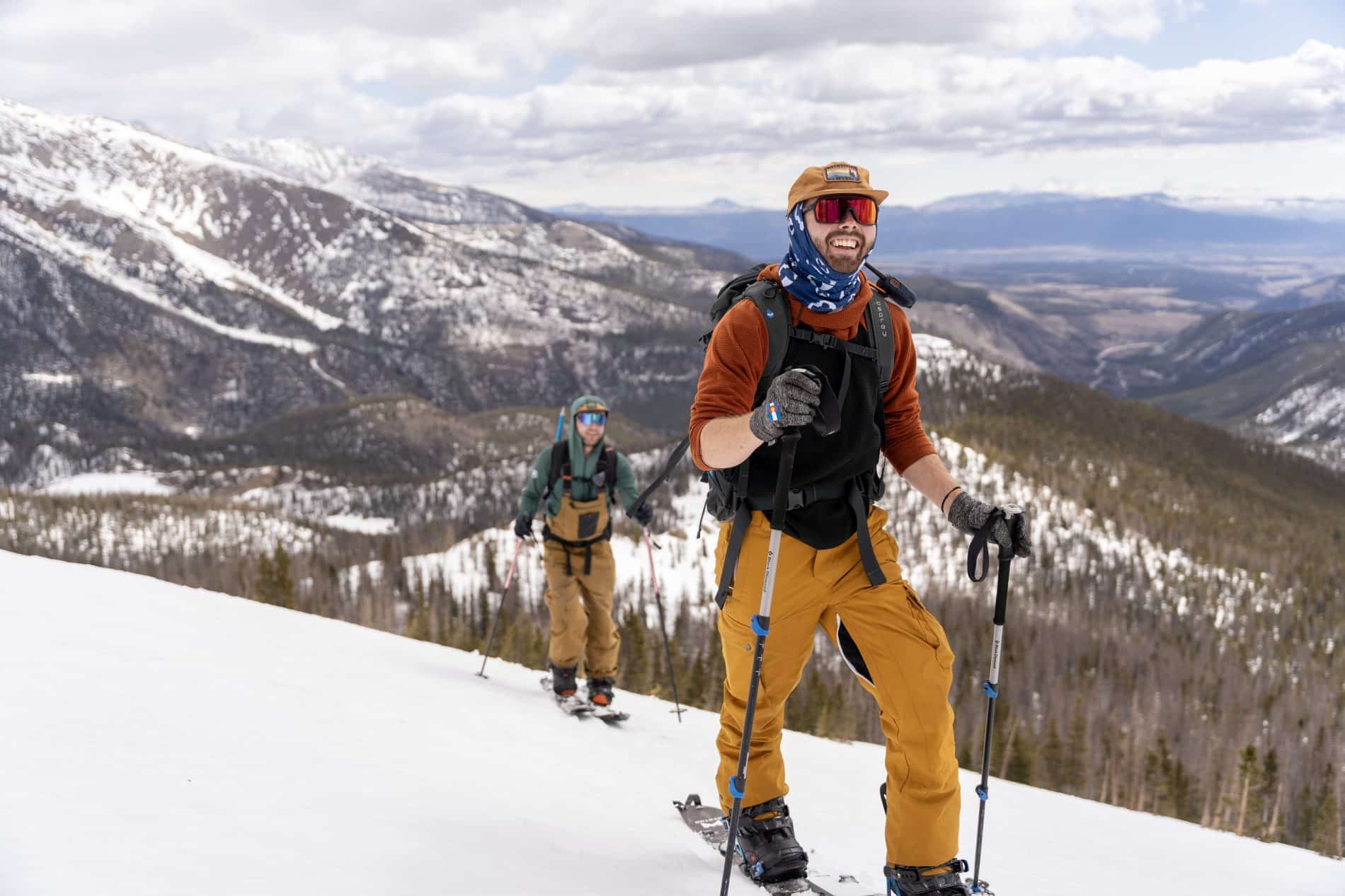 Backcountry skiers with a mountain view