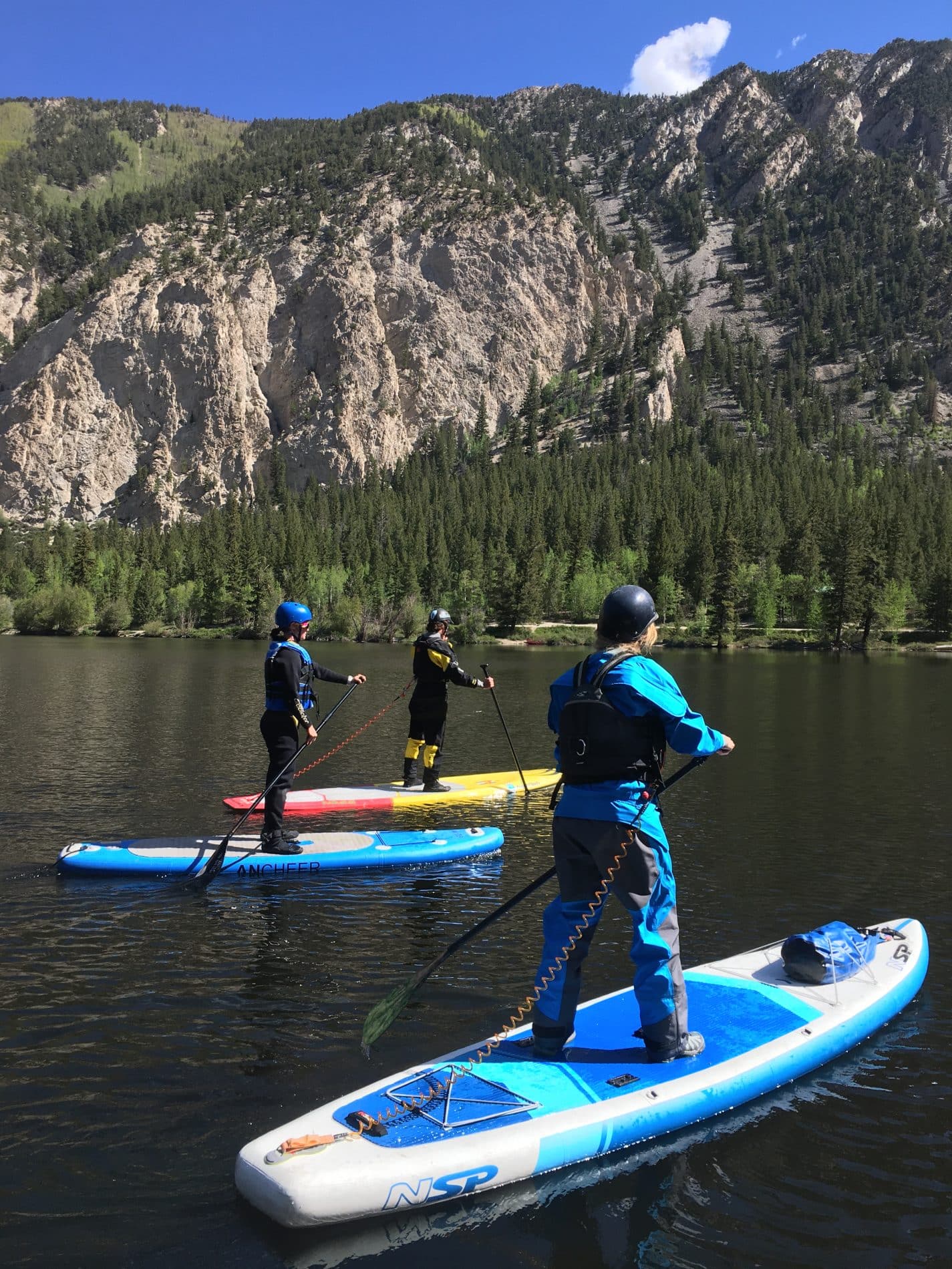 paddleboarding on a peaceful lake