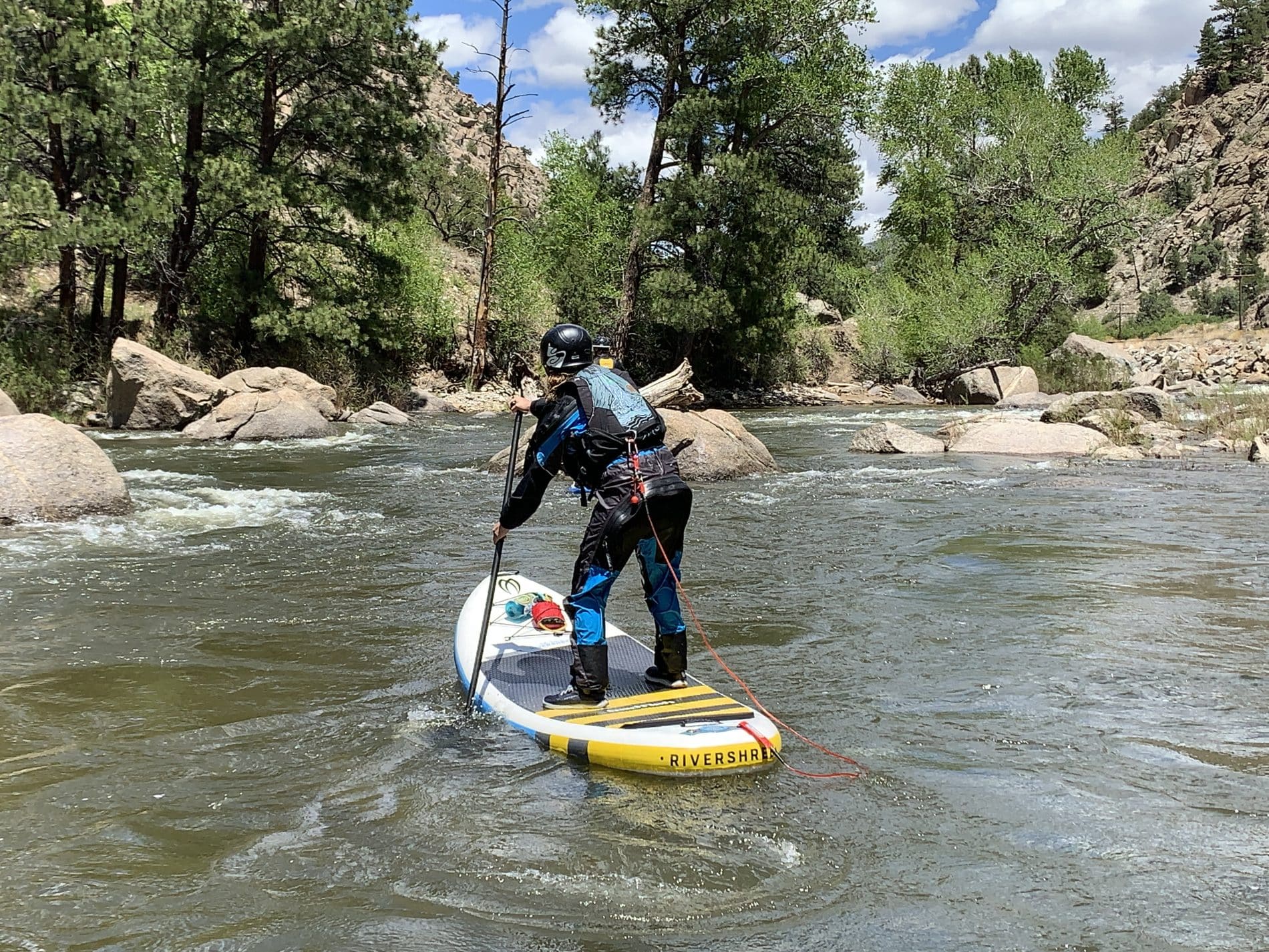 paddleboarding on a river