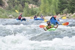 Kayakers on white water
