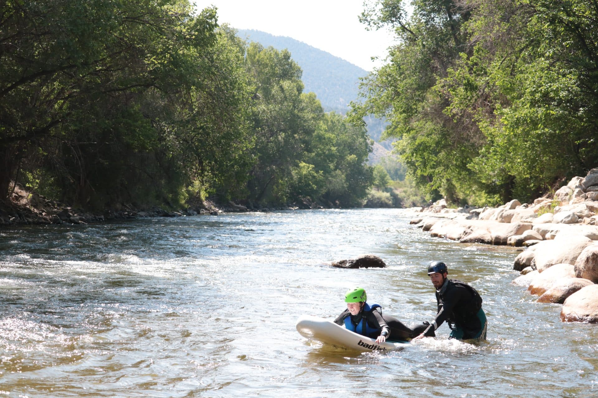 kid learning to surf
