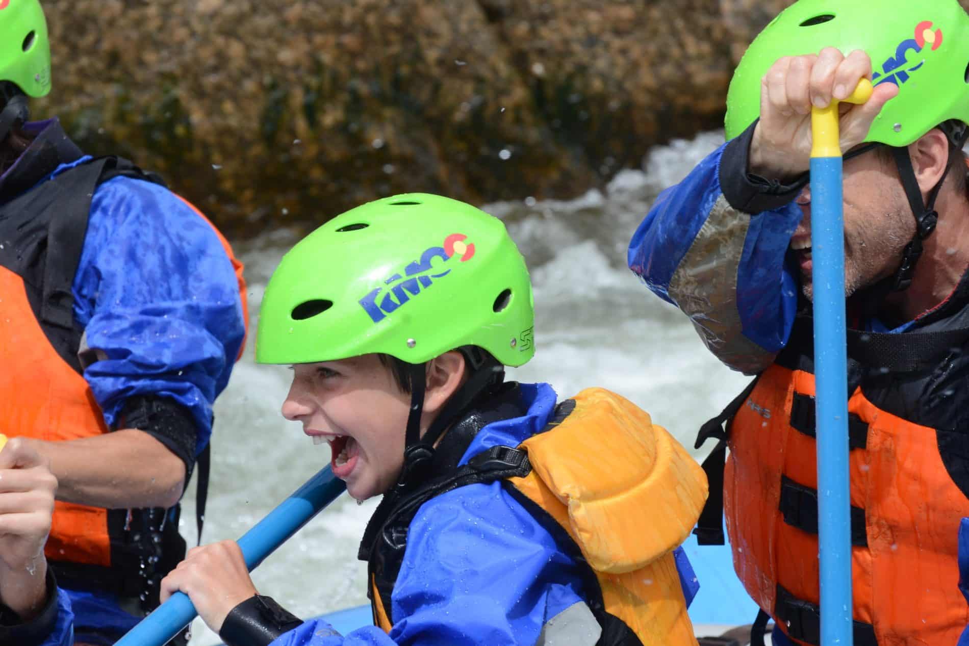 kid joyfully rafting