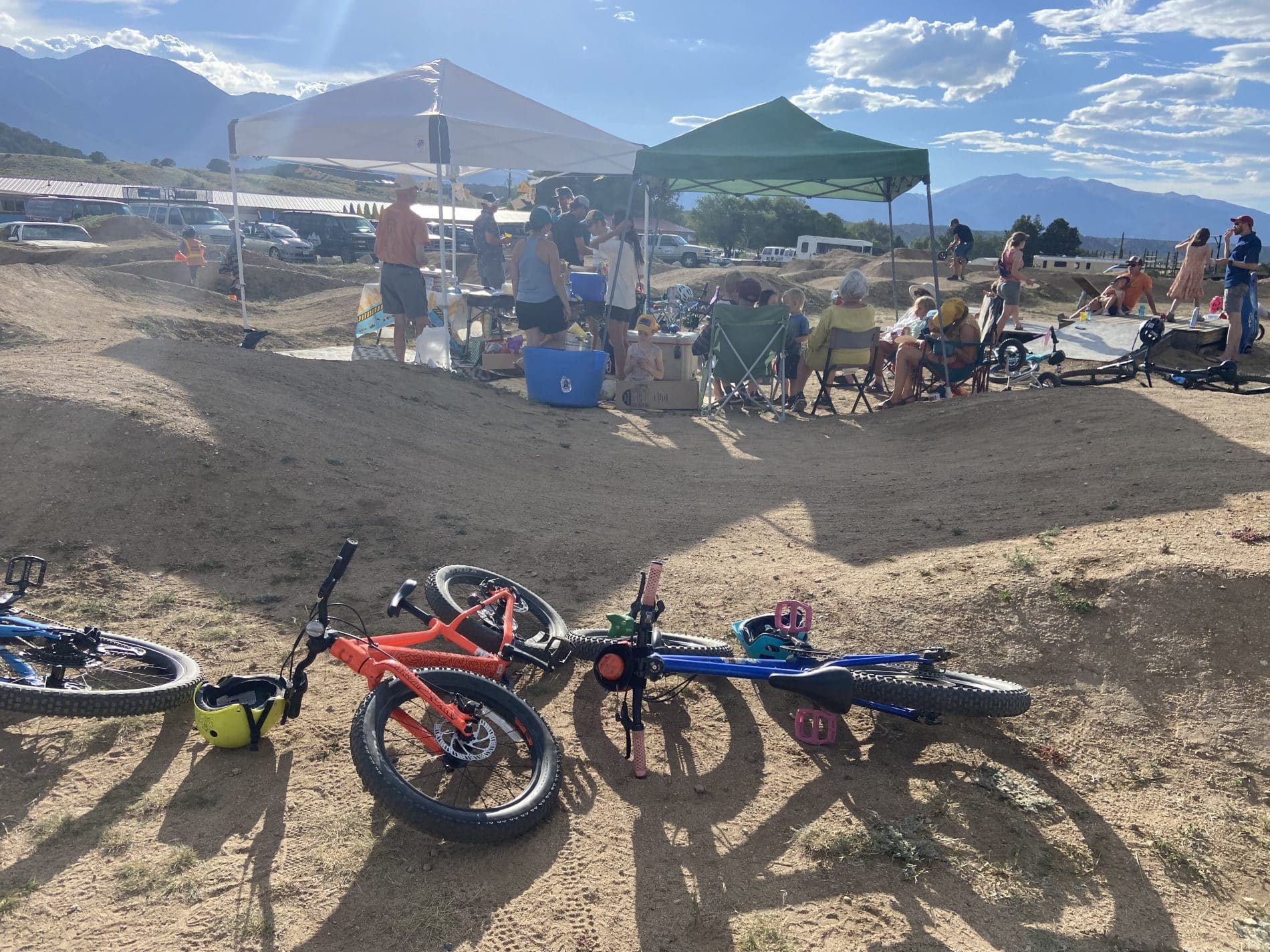 People gathered with bikes at the park