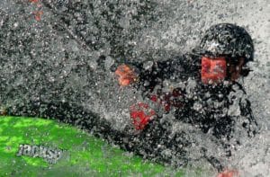 Kayaker surrounded by a splash